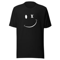 "Wink Emoji" - the perfect T-shirt for any occasion! Whether you're looking for a funny gift for a geeky friend, a retro-inspired tee for yourself, or a unisex top for the whole family, this Wink Emoji T-shirt is sure to bring a smile to everyone's face. This T-shirt is the perfect way to express emotion without saying a word. With its iconic wink emoji design, it's sure to make a statement. It's a great way to show your optimism and happy attitude, and it's sure to be a hit with men, women, and Funny Graphic T-shirt For Fans, Funny Graphic Design T-shirt For Fans, Unisex Black T-shirt In Ring-spun Cotton, Funny T-shirt With Screen Print For Fans, Unisex Black Ring-spun Cotton T-shirt, Funny Screen Print T-shirt For Fan Merchandise, Funny Black Shirt For Streetwear, Black T-shirt With Funny Print For Fans, Black Short Sleeve Novelty T-shirt