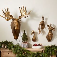 christmas decorations and deer heads on the wall