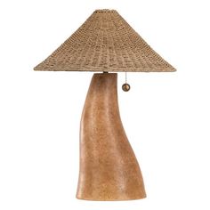 a table lamp made out of wood and wicker with a brown shade on top