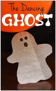 a paper ghost with the words, the dancing ghost on it's face and an orange balloon in the background