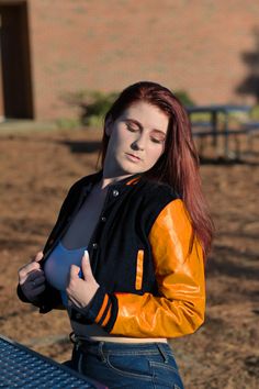 Women Crop top Classic Style Black Wool Orange Genuine Leather Sleeves Varsity Letterman Baseball Jacket Introducing the Custom Letterman Women's Classic Varsity Jacket - a perfect blend of style and comfort with its black wool and green genuine leather sleeves. Perfect for any occasion, this jacket exudes timeless charm and sophistication. Expertly crafted with quality materials, it's a must-have for any fashion-forward individual. If your required Size & Color Combination is not listed then pl Fitted Fall Outerwear For College, Fitted Fall Outerwear For Casual Wear, Fitted Brown Varsity Jacket For Fall, Fitted Varsity Jacket For College In Fall, Fitted Casual Orange Outerwear, Casual Fitted Orange Outerwear, Orange Outerwear For Fall Streetwear, Orange Outerwear For Streetwear In Fall, Orange Streetwear Outerwear For Fall