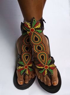 African beaded gladiator shoe Very beautiful and unique too Fully handmade Rasta sandals Bohemian T-strap Sandals With Round Toe, Black Beaded Bohemian Sandals, Black Bohemian Beaded Sandals, Bohemian T-strap Toe Post Sandals For Festivals, Bohemian T-strap Closed Toe Sandals For Festivals, Traditional Black Sandals For Festival, Bohemian Closed Toe T-strap Sandals For Festivals, Adjustable Single Toe Strap Sandals For Festivals, Traditional Multicolor Ankle Strap Sandals