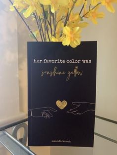 there is a card with some yellow flowers in it