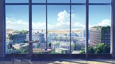 an empty room with large windows looking out onto the city below and buildings in the distance