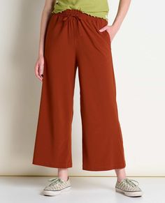 A wider leg for even more flow, more drape and more fun. A ruffle at the waist gives her some feminine flair, and a tie, hand pockets and secure zip make her a vacation must-have. Fruit Print, Wide Leg Pant, Womens Size Chart, Ankle Pants, Small Tops, Leg Pants, More Fun, Quick Dry, Wide Leg Pants