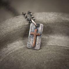 Handmade Sterling Silver 925 and copper Cross necklace pendant. The silver necklace was oxidized to create more antique rustic look. ~PERSONALIZATION~ I also offer the option to engrave a personal message on the pendant's back. You can select any meaningful message, quote, significant date, or any other sentiment of your choice." It is a unisex necklace so it fits both men and women. ✦ Shipping: I will ship all my jewelry within a few days from your order. A tracking number is provided, so you c Copper Cross Jewelry For Gifts, Hammered Brown Jewelry For Gift, Brown Hammered Jewelry As A Gift, Brown Hammered Jewelry For Gift, Soldered Cross Necklaces As A Gift, Silver Hammered Copper Necklace, Rustic Cross Jewelry For Gifts, Rustic Cross Jewelry Gift, Brown Patina Necklace For Gift