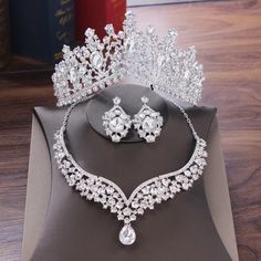 the tiara and earrings are on display