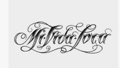 the word tattoo art written in cursive script