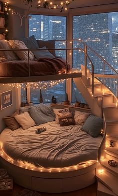 a bedroom with lights on the ceiling and a spiral bed in the middle, surrounded by stairs