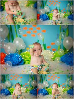 a baby sitting on the ground surrounded by balloons