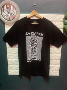 RARE!! Shirt Band JOY DIVISION size On tag L Shirt still in good Condition 9/10  Actual Measurement : Length arm pit to arm pit 20 Inches Length back collar to hem : 27 Inches Please look detail at the photo for confirmation. If any question please ask to me. All item/pieces will be shipped within 1-2 business day. Postal receipt or proof of shipment will be kept for future refference.  dont expect the pieces in mint condition unless state.Its because vintage or used item may have sign of wear.T Any Question?, Joy Division, Telephone Number, Mens T Shirts, Mens Graphic Tee, Measurement Length, Division, Mint Condition, Bathing Beauties