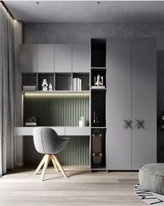 an office with grey walls and white furniture