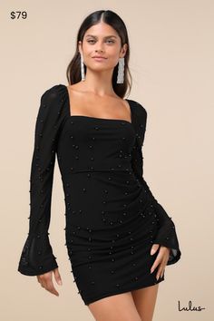 Get your bachelorette party started in the most glamorous way possible with the Lulus Flirty Luxury Black Mesh Pearl Long Sleeve Mini Dress! Gleaming, black pearl-like details decorate this stretchy mesh dress that features a trendy square neckline and sheer, slightly flared long sleeves (with elastic at the shoulders). The high, fitted waist tops a figure-flaunting, bodycon mini skirt with ruched detailing along the side for a flattering finish. Hidden back zipper/clasp. Fit: This garment fits Hoco Dresses Tight Long Sleeve, Bachelorette Chicago, Glamorous Dresses Luxury, Black Dress With Long Sleeves, Winter Dance Dresses, Black Dress With Pearls, Mini Dress Mesh, Hoco Dresses Long Sleeve, Black Sparkly Dress