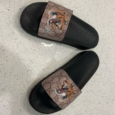 Like New Gucci Tiger Slides Gucci Tiger, Shoes Gucci, Mens Slides, Gucci Shoes, Black Tan, Black And Tan, Flip Flop Sandals, Flip Flops, Shoes Sandals