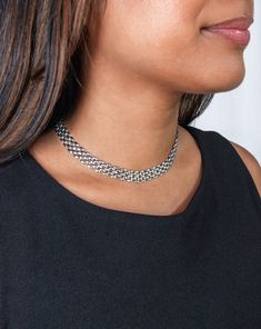 Inspired by vintage link watch bands, the interlocking lattice chain choker features a unique and intricate pattern that takes classic sophistication to a new level. Its adjustable fit ensures comfort while making a bold statement, perfect for elevating any outfit with a modern flair.- Stainless steel base - Length: 13" + 3" extender (adjustable)- Lobster clasp- Available in gold + silver - Engraved with signature MC branding- Hypoallergenic, non-tarnish, water-resistant Beautiful Snakes, Sparkle Shoes, Watch Repair, Ring Bag, Zodiac Pendant, Repair Shop, Anklet Bracelet, Anklet Jewelry, Accessories Rings