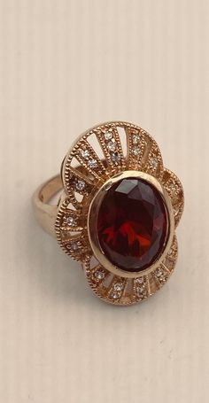 Vintage red Bohemian garnet set with white sapphire band 925 sterling silver Lovely Bohemian Garnet ring golden 925 Sterling silver Size 6 My jeweler can custom re size for a $20 fee. All rings are shipped in a nice gift box. Check out our over a THOUSAND great reviews!!! Engraving is $4 per letter and is not always perfect depending on the piece. It can take a few days if the jeweler is busy. This is payable to Paypal Judithsltd@gmail.com Collectible Garnet Ring Jewelry, Collectible Garnet Ring, Gold Garnet Jewelry With Diamond Accents, Heirloom Red Jewelry With Diamond Accents, Garnet Ring With Diamond Accents, Red Heirloom Ring Jewelry, Red Heirloom Jewelry, Red Oval Jewelry With Diamond Accents, Red Garnet Jewelry With Diamond Accents