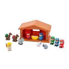 a small wooden toy set with animals and a baby jesus in the manger surrounded by other toys