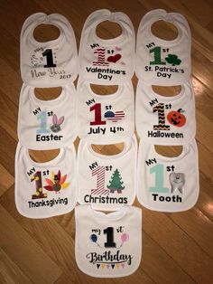 six bibs with the names of each child's first birthday and 1st birthday