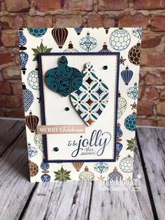 a handmade card with an ornament in the shape of a hot air balloon