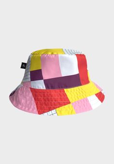 Our bucket hats are back this season! We have different types of prints in water-proof fabric, from the brightest print to the most sober monochromatic style. Our hats have a classic design, they are reversible, and their fabric is soft and breathable for a perfect and comfortable fit. Choose your favorite and go for a walk! DETAILS: - Double sided hat  - Windbreaker - Antifluid - Solar protection - Water resistant - 100% polyester Would you like to know more about our products? Please head to pluvorain.com If you like to know more about our fabrics: https://www.lafayettesports.us/technologies-1 PLUVO: Our initial goal was to create distinctive, reliable, and durable outdoor clothing. At this point, we are pleased to say that our products have been recognized not only for their functionali Cheap Fun Yellow Bucket Hat, Cheap Multicolor Bucket Hat For Festivals, Trendy Multicolor Bucket Hat For Outdoor, Summer Outdoor Hat With Graphic Print, Multicolor Bucket Hat For Summer Streetwear, Retro Multicolor Hats For Outdoor, Casual Multicolor Bucket Hat For Streetwear, Multicolor Outdoor Bucket Hat, Multicolor 5-panel Summer Hats