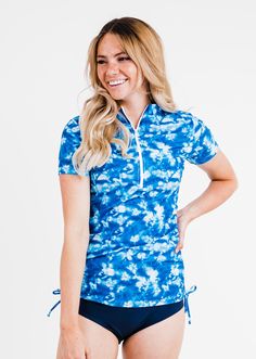 Half-Zip Adele Swim Top Fit & Sizing Tight Fit Sleeve Length 16.5cm (Size S) Top Length 66.5cm (Size S) If you are between sizes, or in doubt, please size up. Features Short Sleeve Mock Neckline Does not feature a Built-in Bra Side ruching creates a flattering cinched look\ UPF 50+ Sun Protection Swimwear Half-Zip Closure With Tab Quick Dry Care Rinse in cold water to wash off any chemicals, chlorinated water or saltwater Machine wash in cold water on gentle cycle Lay f Sporty Fitted Swimwear With Short Sleeves, Sporty Fitted Short Sleeve Swimwear, High Neck Swim Top, High Neck Swim, Comfortable Swimwear, Swim Leggings, Swim Bra, Pink Texture, Swimming Outfit