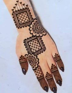 a henna design on the palm of someone's hand