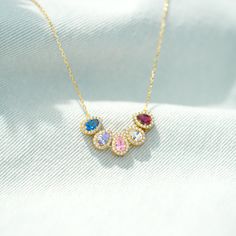 DESCRIPTION Authenticate your commitment to motherhood with this beautiful and purposeful 1-14 Teardrop Birthstone Necklace. Craft a special piece for yourself - pick from up to 14 birthstones representing your kids. Whether it's a birthday, mother's day, anniversary, Valentine's Day, this necklace is sure to make her heart flutter. SPECIFICATIONS Length: 15" with 2" ExtensionStone: AAA Grade Cubic Zirconia Heart Flutter, Personalized Gifts For Mom, Necklace Craft, Necklace Personalized, Birthstone Necklace, Gift For Mom, Birthstone, Mother's Day, Gifts For Mom