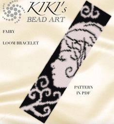 a cross stitch bookmark with the words kiki's bead art on it