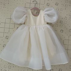 Never Worn Cute Cream Puff Sleeve Dresses, Cute Cream Princess Dress For Dress-up, White Fitted Short Sleeve Tutu Dress, White Fitted Tutu Dress With Short Sleeves, White Fitted Short-sleeve Tutu Dress, White Princess Tutu Dress With Short Sleeves, Spring Princess Cream Dress, Spring Princess Style Cream Dress, White Fitted Princess Dress For Dress-up