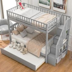 a baby's room with a bunk bed and stairs