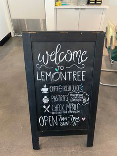 a chalkboard sign that says welcome to lemon tree