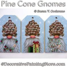 three christmas gift tags with pine cones on their heads and presents in front of them