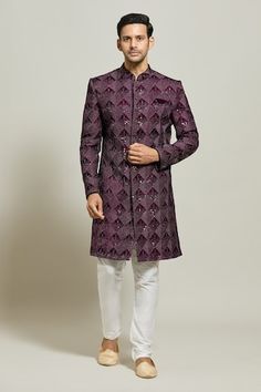 Wine sherwani with all over geometric pattern, thread and sequin embroidery. Paired with a white churidar. - Aza Fashions Navratri Long Sleeve Sherwani With Mirror Work, Long Sleeve Sherwani With Mirror Work For Navratri, Formal Bandhgala With Mirror Work, Formal Sherwani With Mirror Work, Bandhgala With Resham Embroidery For Reception Navratri, Resham Embroidered Bandhgala For Reception Navratri, Formal Sherwani With Mirror Work For Transitional Season, Formal Transitional Sherwani With Mirror Work, Straight Kurta Sherwani With Mirror Work For Diwali