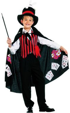 a little boy dressed up in a costume and holding a wand with playing cards on it