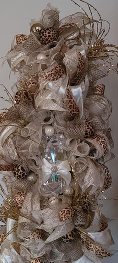 a wreath with leopard print and bows on it