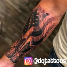 a man with an american flag tattoo on his arm