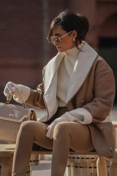 Experience sophistication and warmth in our Tan Presley Faux Leather Teddy Coat. Expertly crafted in a faux leather and sherpa combo, it features a shawl collar, long sleeves, and convenient side pockets with button front closures. Coordinate the full look with our Jenni Turtleneck Sweater Top. Oversize. Materials: (Coating) 100% Polyurethane (Fabric) 100% PolyesterLength: (full) 32 in. (sleeve) 24 in.Product Origin: ImportedWashing Instructions: Dry clean only Model is wearing size S Drop Sleeve, Faux Leather Coat, Teddy Coat, Full Look, Minimalist Wardrobe, Leather Coat, Shoulder Sleeve, Turtleneck Sweater, Stay Warm