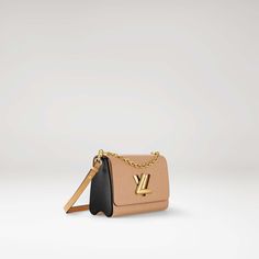 LOUIS VUITTON® - Twist Mm - Camel Beige Monogram Canvas Bag For Evening, Evening Monogram Canvas Shoulder Bag In Tan, Lv Twist, Louis Vuitton Official Website, Dream Bags, Louis Vuitton Official, Louis Vuitton Twist, Bag Collection, Chain Bag