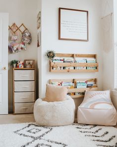 a bedroom with a white rug and wooden crates on the wall