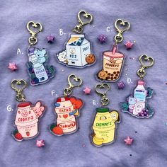 six different key chains with cartoon characters on them