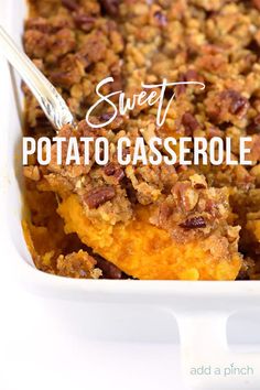 sweet potato casserole in a white dish with a spoon