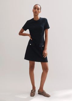 Effortlessly polished, ME+EM's Navy Textured Short Sleeve Shift Dress can be layered under tailored jackets now for extra warmth, or worn alone in the summer. Shop now. Fitted Mini Dress With Pockets For Daywear, Elegant Daywear Mini Dress With Pockets, Elegant Mini Dress With Pockets For Daywear, Tailored Mini Length Summer Dresses, Tailored Summer Mini Dress, Summer Tailored Mini Length Dresses, Tailored Mini Dresses For Summer, Summer Tailored Mini Dress, Elegant Shift Dress With Pockets