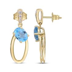 Go for a unique look with these sophisticated Swiss blue topaz and diamond doorknocker earrings. 10K yellow gold Graduating round-cut diamonds adorn each tapered post Beneath, an oval doorknocker dangle showcases a bright oval-cut natural Swiss blue topaz Total diamond weight is 1/15 carat Friction backs Swiss Blue Topaz, Round Cut Diamond, Oval Cut, Blue Topaz, Round Cut, Topaz, Diamonds, Yellow Gold, Yellow