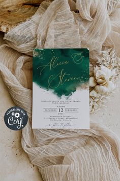 the wedding stationery was done in green and gold