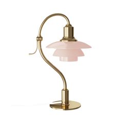 a light that is on top of a white tablecloth and has a pink glass shade