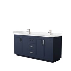 a double sink vanity with two faucets on the top and one under it