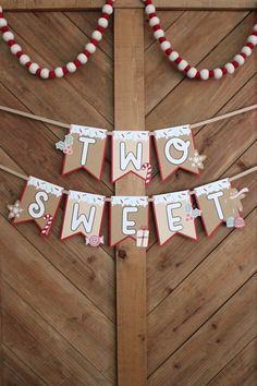 two sweet bunting banner hanging from a door