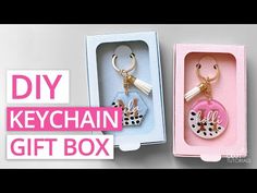 two key chains in a box with the words diy keychain gift box