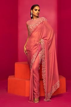 Blush pink pre-draped saree with cutdana, sequin, crystal embroidered border. Paired with floral embroidered blouse. - Aza Fashions Reception Saree, Round Border, Draped Saree, Organza Lehenga, Ruffle Saree, Wedding Blouse Designs, Party Sarees, Drape Saree, Wedding Blouse