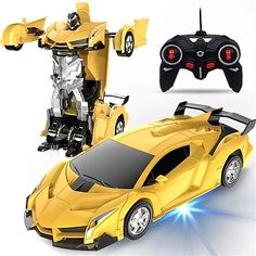 a yellow toy car with a remote control controller and an image of a robot on the back